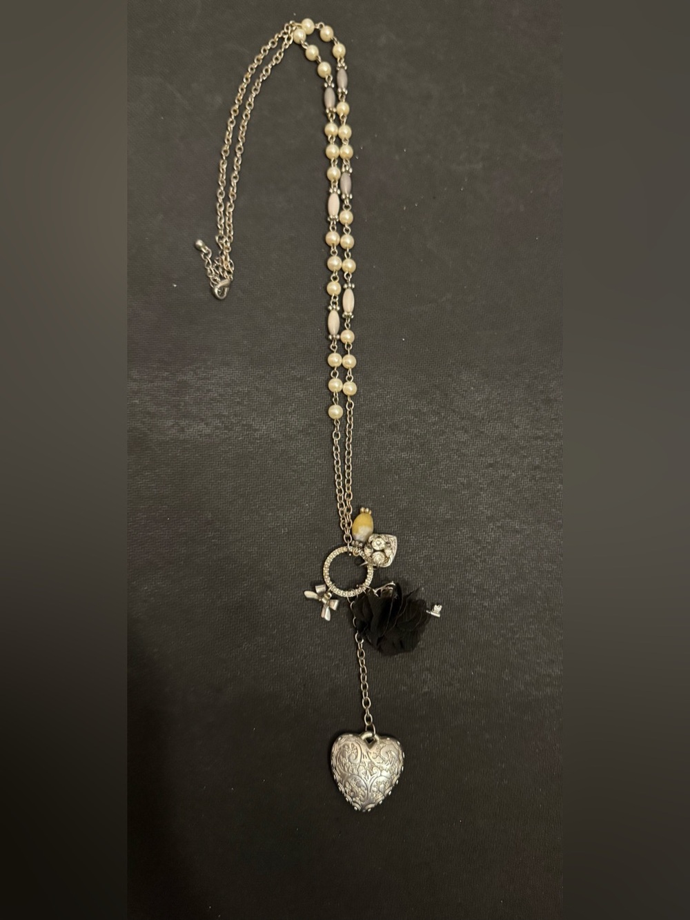 Silver Tone Chain With Peal Looking charms & heart,key & Bow charms Hanging off